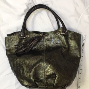 Puntotres large leather hobo style purse